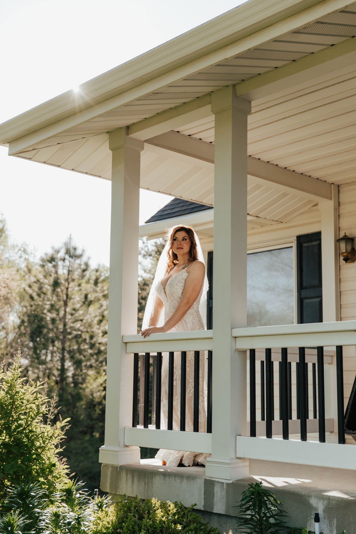 The bride on the porch in evening light